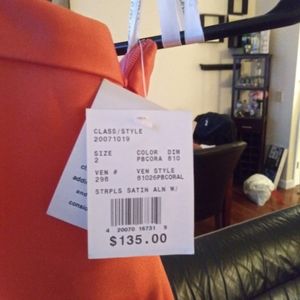 David's Bridal strapless Coral A-line fitted dres